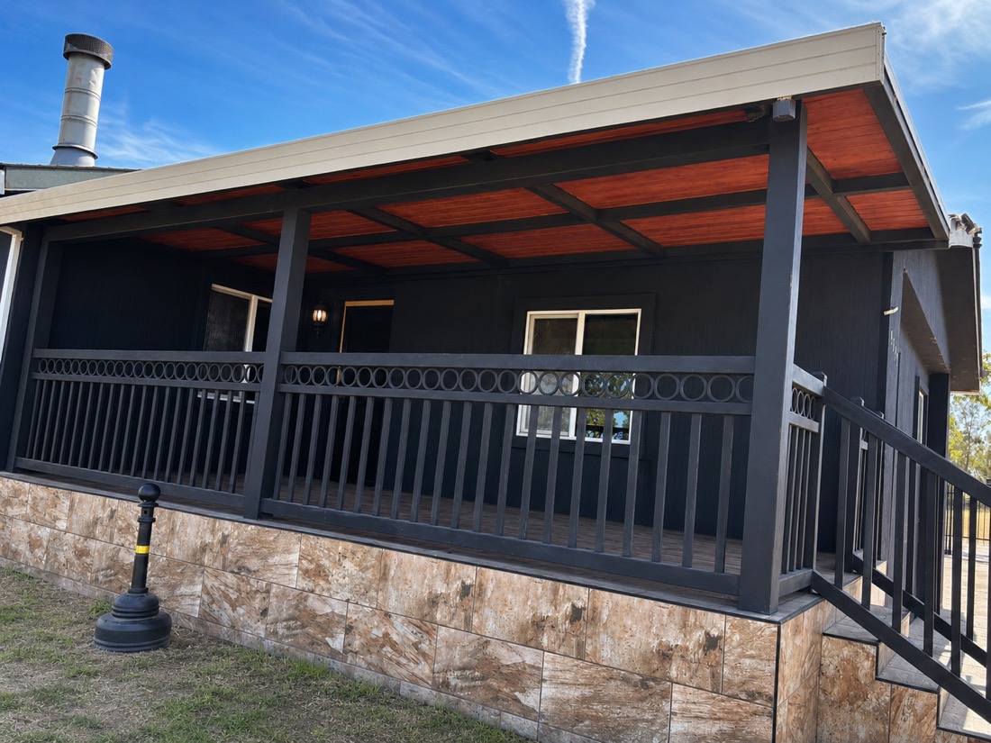 Decorative iron porch railing — Davis