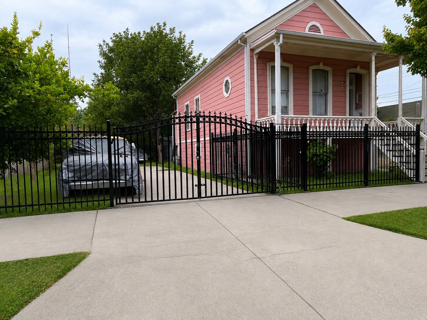 Custom iron driveway gate and fence — Sacramento