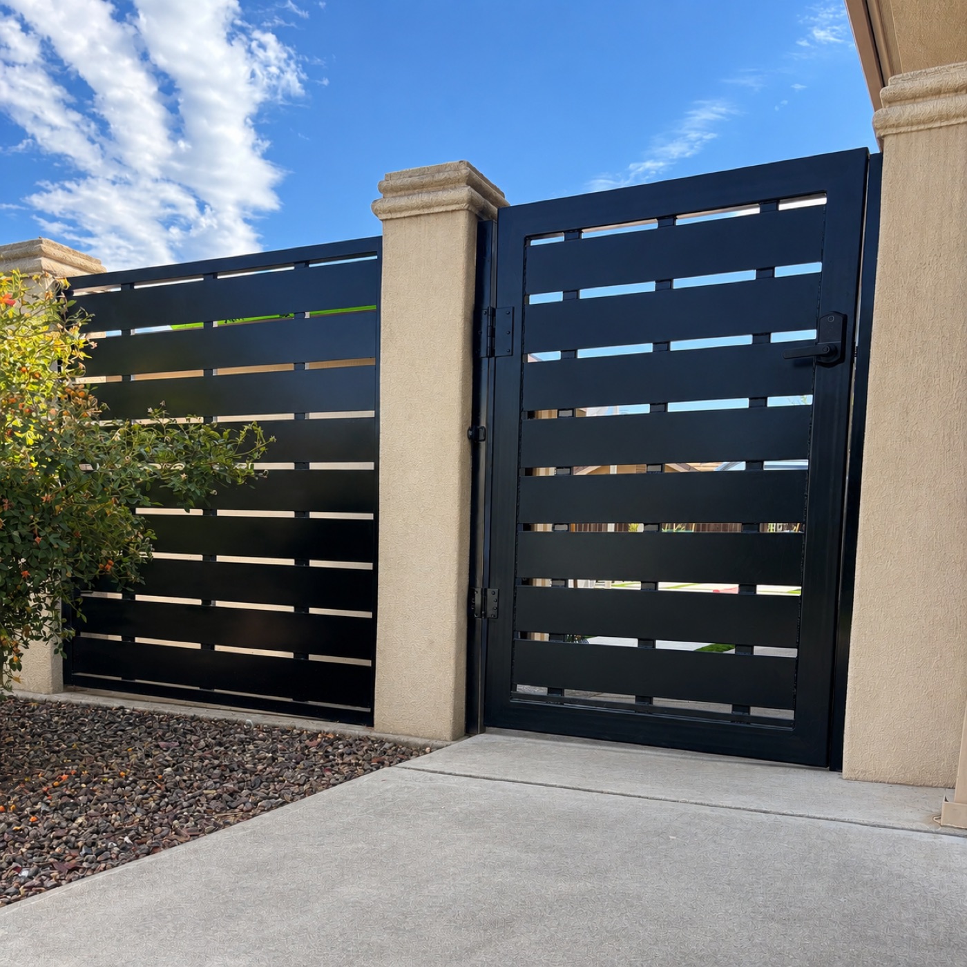 Modern slat metal gate at a home — Sacramento